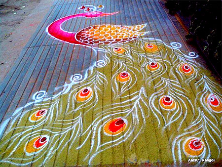Simple street peacock rangoli 2015