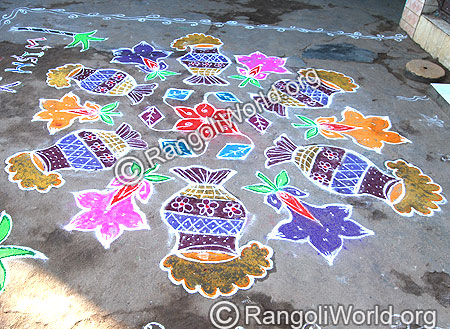 Pongal pot in woods stove Pulli Kolam